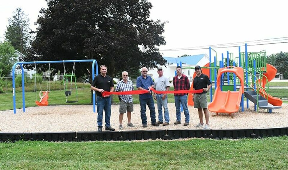 CCM/ Carol McIntireA ribbon cutting ceremony marked the completion of a playground project at Monroe Twp. Park. Shown from left are Aaron Honor, facility manager at Carroll County Energy; Trustees Randy Dingler, Brian McIntire and Tom Jones, Chris Day, maintenance manager at Carroll County Energy; and Zach Kent, community relations representative for Encino Energy.