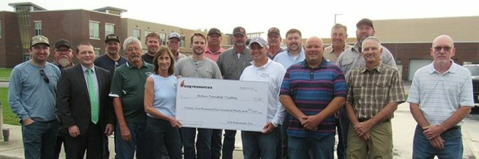 CCM Photo/Thomas ClapperCheck presentation. First row (left to right): Cory Heems EOG, Brown Local Superintendent Mark Scott, Malvern Mayor Bob DeLong, Brown Twp. Fiscal Officer Peggie Conner, EOG Vice President and General Manager Heath Work, Brown Twp.Trustees Chris Rotondo, John Dustman and Mike McCort. Second row: EOG personnel Troy Schupp, Michael Kilen, Jeremy Ormsey, Derrik Holmes, Ben Blackwelder, Jody Jones and Lucas Shipper. Back row: EOG personnel Skeeter Powledge, Shane Elam, Donald Mayo and Ted Kelly.