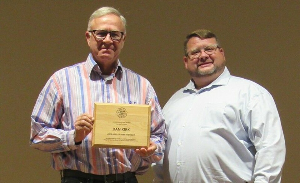 CCM/ Thomas ClapperAT RIGHT: Dan Kirk (left) is the 2023 Hall of Fame Inductee for the Carroll County Farm Bureau. President Jim Coy congratulated and offered Kirk a plaque.