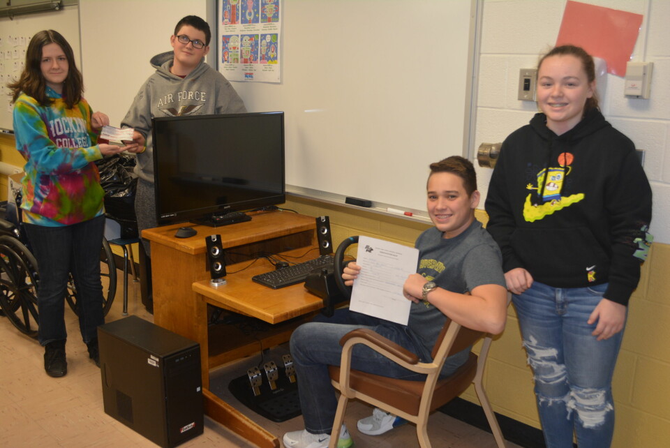 SADD Club receives donation to cover cost of driving simulator