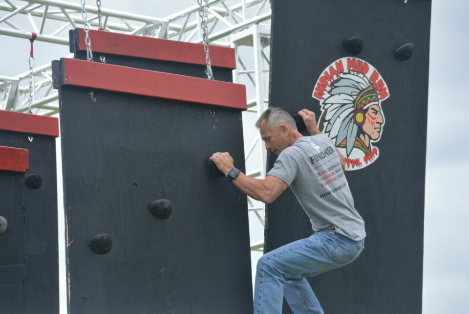 2017 Mud Run offers more than ever before Hubie Cushman is pictured working his way down the Indian Mud Run’s floating wall obstacle that he created. The obstacle will be featured at this year’s event, which will be held Saturday, June 24. The obstacle race will start and end at the former Hilltop Golf Course across from Lake Park. Josie Sellers | Beacon