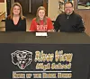 River View High School’s Zoe Smalley, center, signed to play soccer at Wheeling Jesuit University. She is pictured with her mother Lynnette Dobson and father Chris Smalley. Josie Sellers | Beacon
