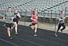 Members of River View High School’s indoor track team warm up on the track during practice on Feb. 23. Josie Sellers | Beacon