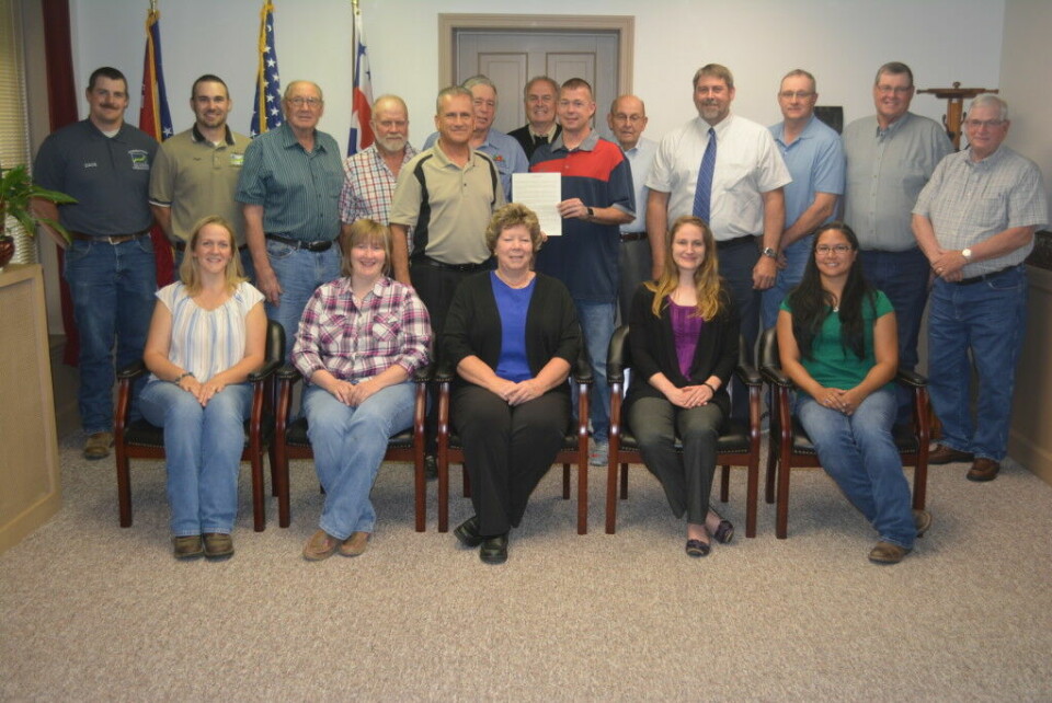 Commissioners present SWCD 75th anniversary proclamation Pictured are past and present employees and district supervisors who have been involved with the Coshocton Soil and Water Conservation District over the years. Holding the proclamation celebrating the organization’s 75th anniversary is Greg Waters, chairman of the board of supervisors. At his left is Commissioner Gary Fischer and at his right is Commissioner Curtis Lee. The commissioners honored the Coshocton Soil and Water Conservation District with a special proclamation to commemorate their 75th anniversary at their regular meeting on May 24. Josie Sellers | Beacon