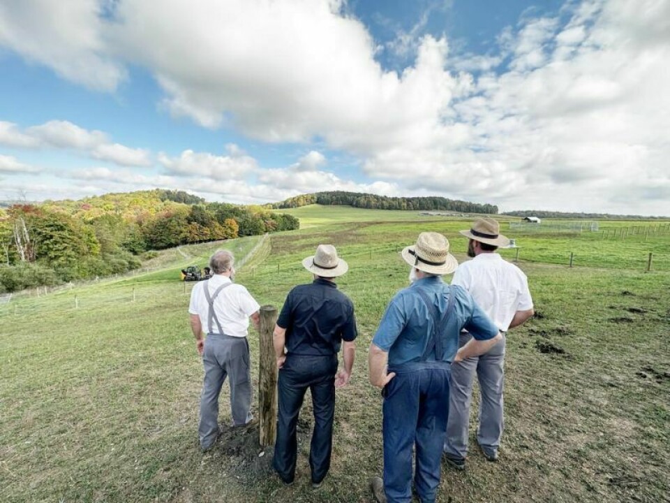 The directors of Froman Hill Boys Ranch watch the progress being made on a fence project consisting of around 2 miles of fence on Saturday, Oct. 7. The project took the collaboration of more than a dozen companies that donated time and material to the effort. Building a fence through unity