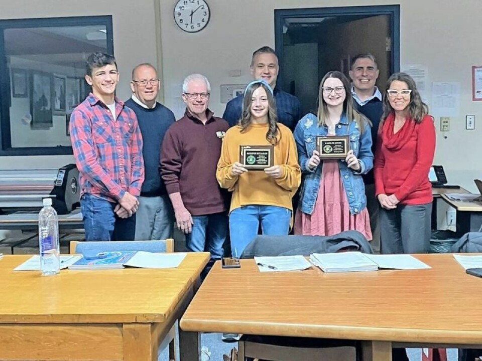 Mitchell Tetreault, left, Bob Hannon, John Shrock, Addison McCaslin, James Miller, Kaitlyn Speed, Mike Warkall and April Beachy Garaway Board of Education discusses coaches pay