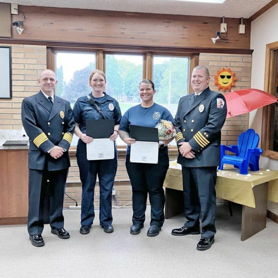 Fire Chief Steve Laskey, left; Paige Sugalski, firefighter/emergency medical technician; Madeline Smith, firefighter/paramedic; and Assistant Fire Chief Steve Joki. Strasburg Council to provide resource officer