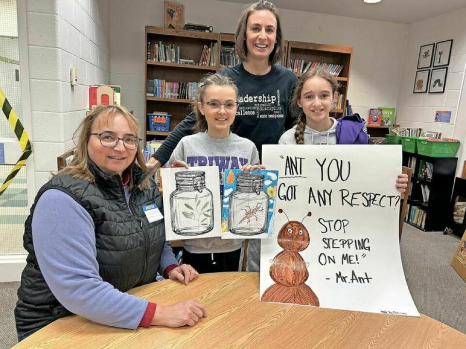 Among those participating in Bugapalooza at Wooster Township Elementary School were Jeni Filbrun, left, zookeeper and program manager for the Ohio State University United Titanium Bug Zoo; student leadership team member Harper Mays; leadership team adviser Kristie Shoulders; and student leadership team member Ashlyn Haddad. The Bug Zoo and the leadership team partnered to help students learn about insects. Wooster Township students learn, share about bugs