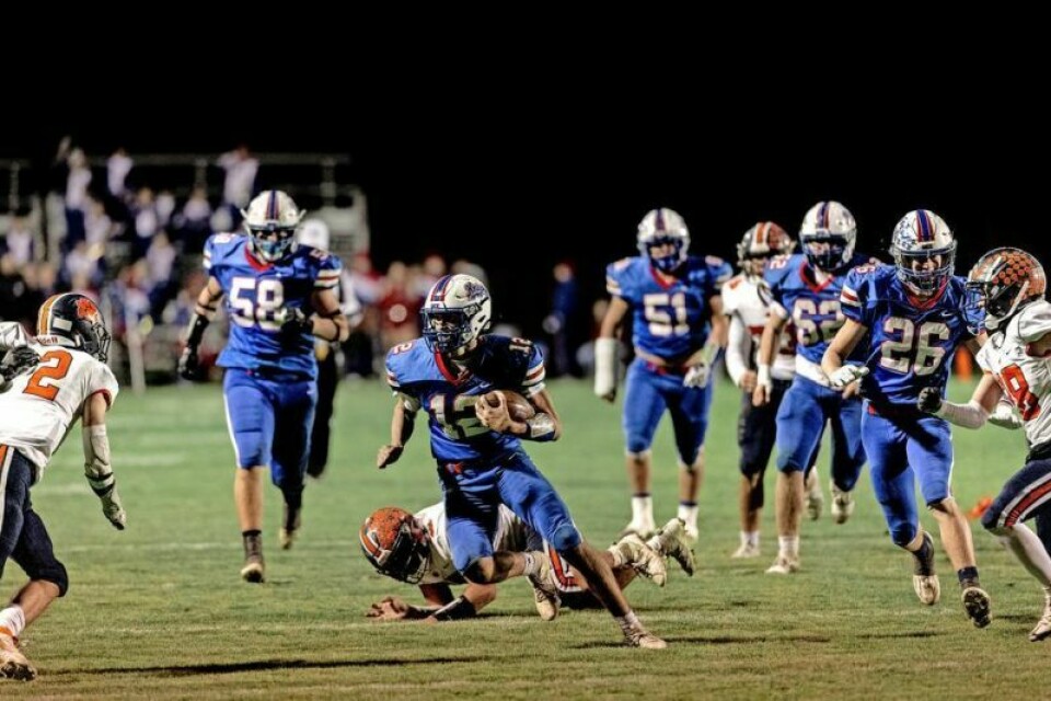 West Holmes’ Morgan Smith (12) was named Co-Offensive Player of the Year in Div. IV by the East District. Several locals earn East District football top honors