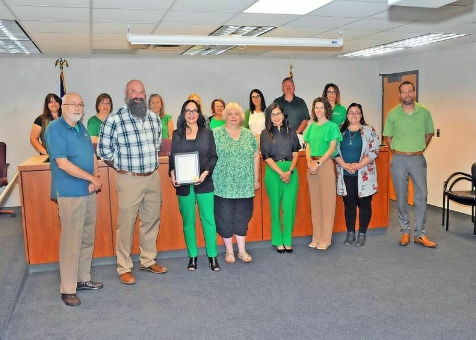 Staff from the Wayne County Child Support Enforcement Agency pose with the Wayne County commissioners after receiving a proclamation acknowledging August as Child Support Awareness Month. Child Support Awareness Month embraced in Wayne County