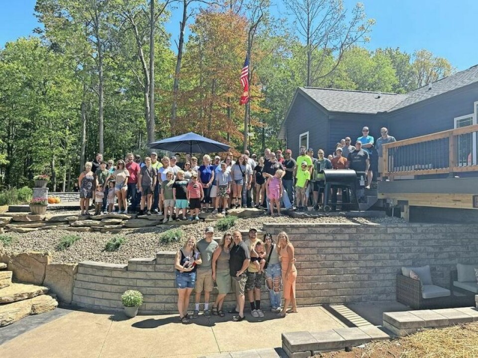 On Sept. 1 a group of volunteers attended the unveiling of a new patio at the home of Travis Stocker of Port Washington. Local veteran honored with free backyard makeover