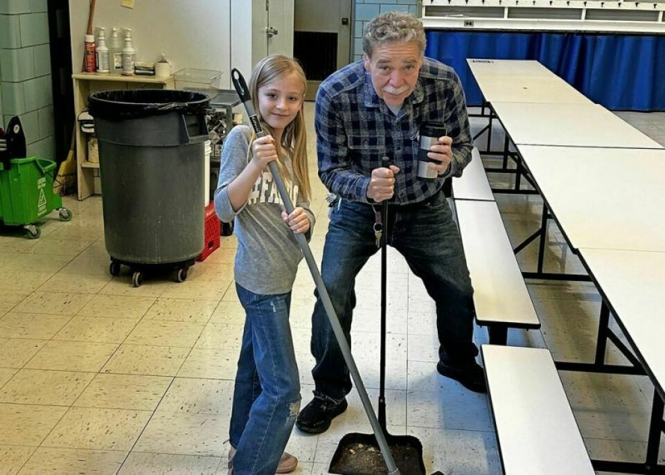 Millersburg Elementary second-grader Giselle Vandeveer joined custodian Sean Hoxworth to help him do custodial work for a day. Vandeveer won the opportunity to do so at the school's reward day auction. Second-grader has fun while helping at school