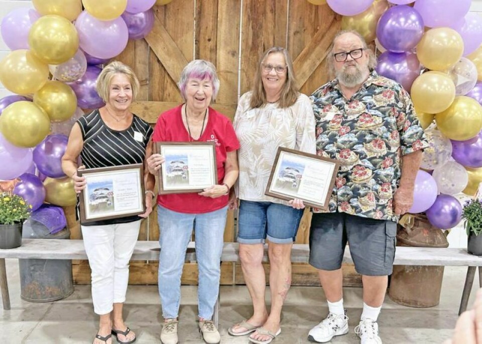 Receiving the Outstanding Volunteer Award from the Wayne County Agricultural Society were Jennifer Rhamy, left, Ruth Bishop, and Cheryl and Frank Bishop. Fair honors volunteers with over a century of combined service