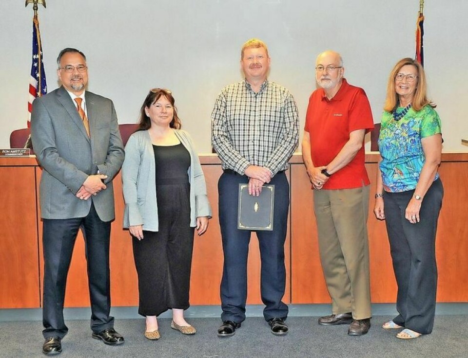 The Wayne County commissioners recognize the hard work of Wayne County Department of Job & Family Services Director Richard Owens, left, benefits recovery supervisor Sherry Vitallo and their team with a proclamation for their efforts in the fight against benefits fraud. WCDJFS and BRU: fighting back against fraud