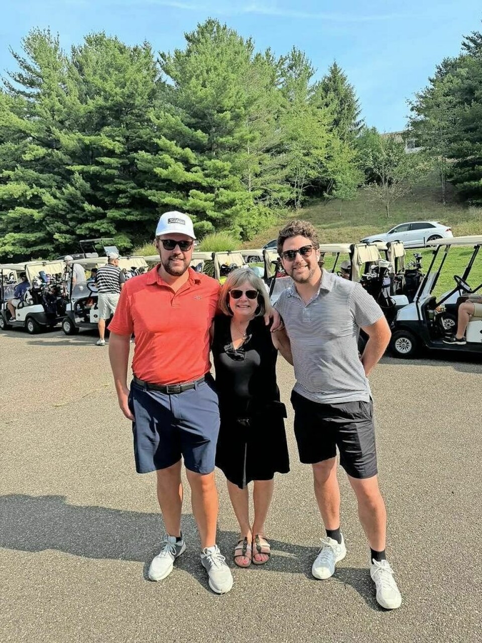 Christopher Rader of Cincinnati, left, Melody Rader of Dover and Scott Rader of Columbus Golf outing exceeds fundraising goal