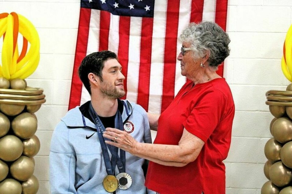 Hunter Armstrong shares a moment with his grandmother Karen Armstrong. Hunter Armstrong greets fans at YMCA