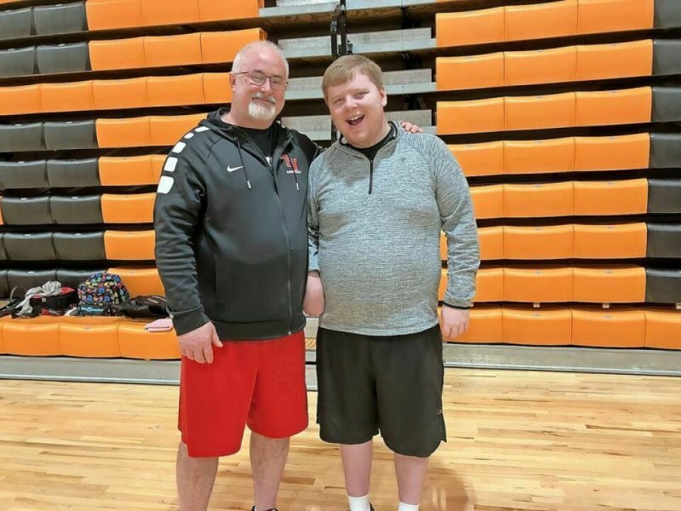 Terry Sites, left, and his son Bailey Sites of Bolivar. Bailey sang the national anthem. His dad is the Tuscarawas Valley boys basketball coach, and Bailey sings at every game. Friendship Games held in Strasburg