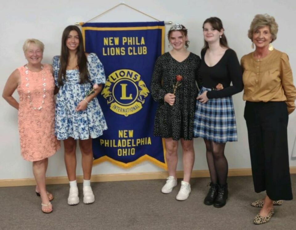 Cathy Kennedy Andrews, left, Avae Buss, Queen Sarah Ciereszewski, Shelby Miller and Becky Andrews Welfly New Philadelphia Lions crown 2023 rose queen