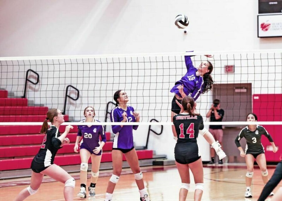 Emma Corbett (18) is one of a half-dozen seniors on the Triway High volleyball team who has helped propel the Titans to the top of the Principals Athletic Conference standings. Titans find connection to lead PAC volleyball race
