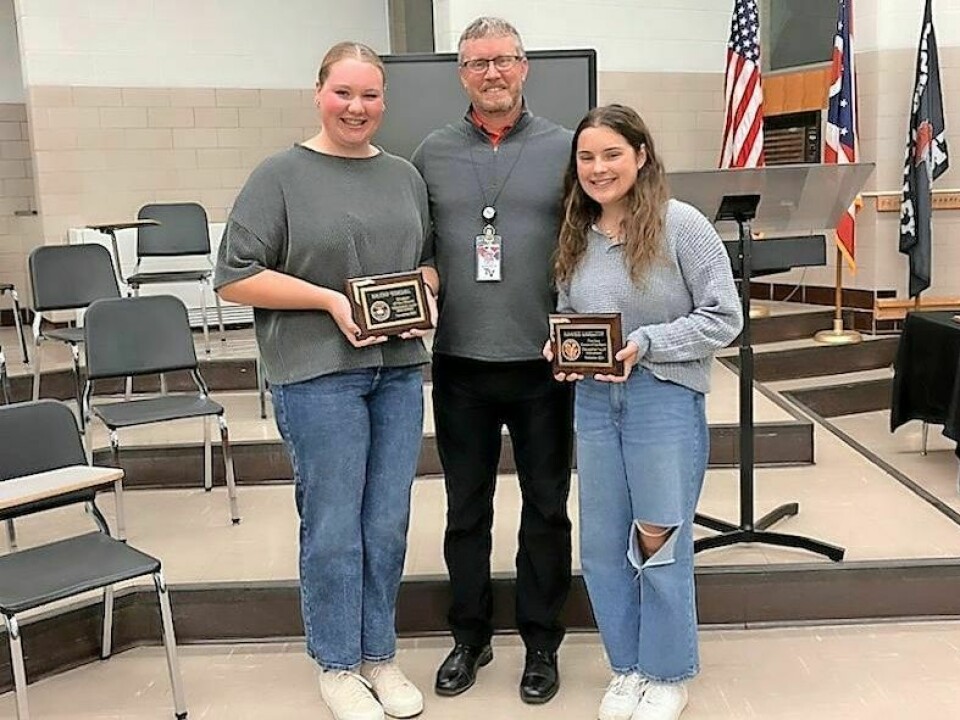 Brynn Goedel, high school, left; High School Principal Jason Phillips; and Maggie Hamilton, fine artist, Student of the Month recipients. Tusky Valley BOE members attend capital conference