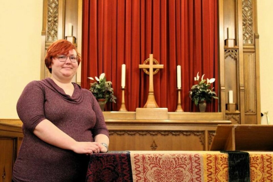 Pastoral assistant Amber Pottmeyer on the altar of the church. First United Church of Christ to hold Celtic service
