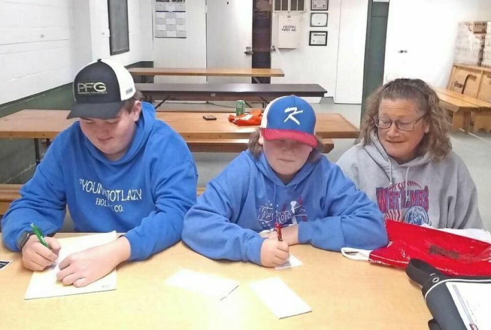 Members of the Holmes County 4-H Shooting Sports Club wrote thank-you letters to area first responders at a recent meeting. 4-H Shooting Sports Club pens thank yous
