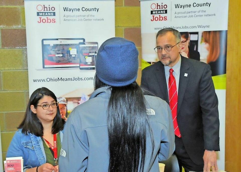 Brittany Crayden and Richard Owens of the Wayne County Department of Job & Family Services talk to an attendee at a previous expo. This year the free event will be April 26 from 10 a.m. to 1 p.m. at the Wayne College campus of the University of Akron. Futures unlocked at Wayne County Career Expo