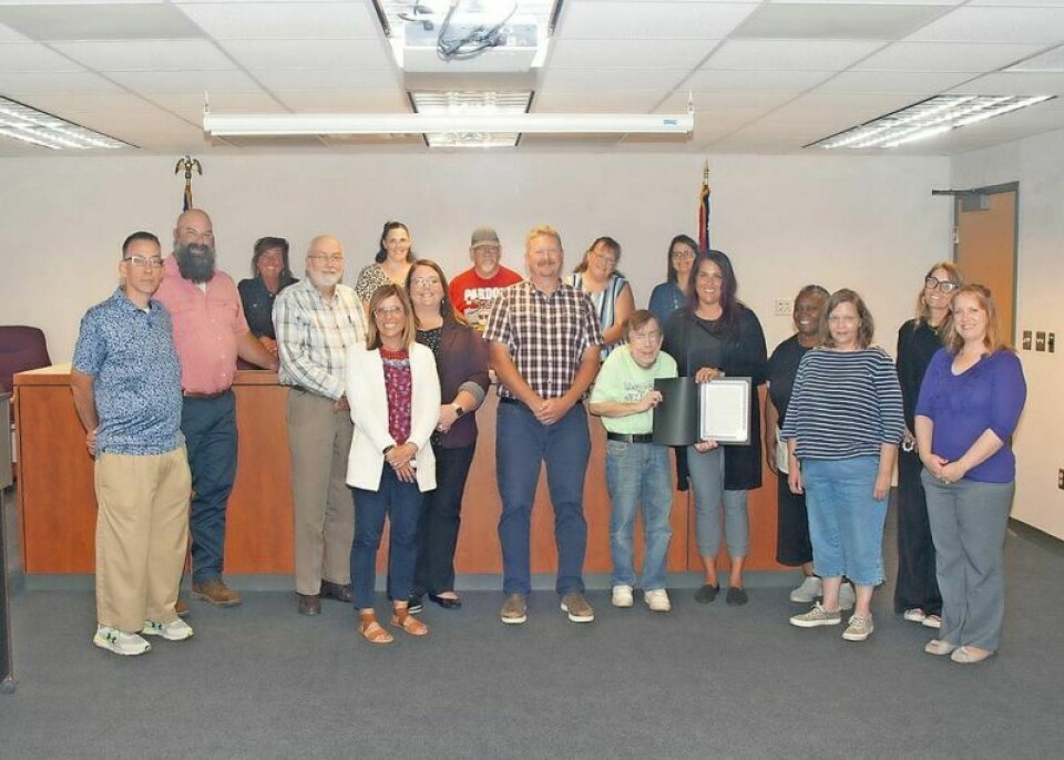 Representatives from Anazao, The Counseling Center, Mental Health and Recovery Board, NAMI, and OneEighty pose with the Wayne County commissioners after receiving a proclamation recognizing Recovery Month. Impact, importance of Recovery Month recognized