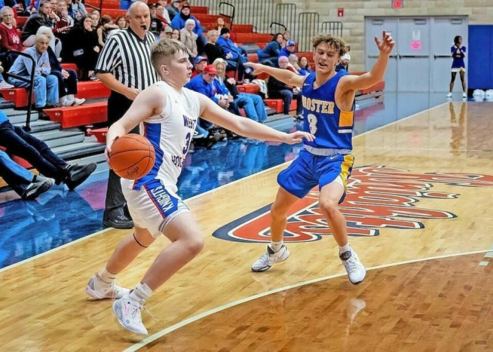 Anthony Sines, right, will be one of the players Wooster High boys basketball coach Che Richardson will rely on this season. The Generals are looking to bounce back from a 9-12 campaign a year ago. New coach, new faces for WHS boys basketball team
