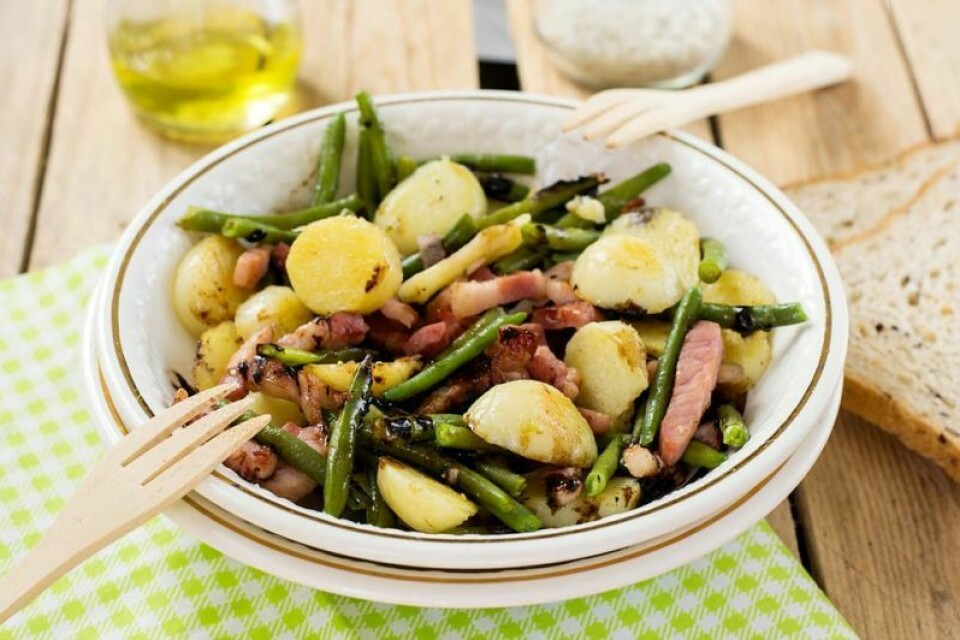 The menu includes ham, green beans, potatoes, a vegetable, dessert and beverages. Free meal offered for all