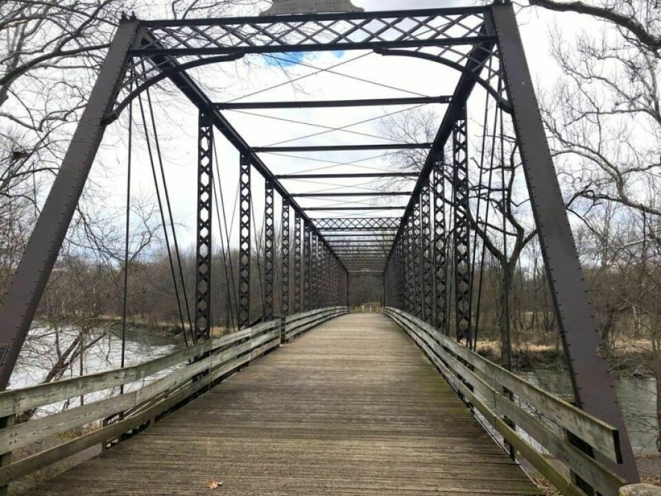 Plans for a trail to connect the old iron footbridge to the Zoar Wetland Arboretum may need to be scaled down due to increased costs for the Towpath Trail extensions through Dover and New Philadelphia. Towpath connector trail in Zoar may no longer be possible