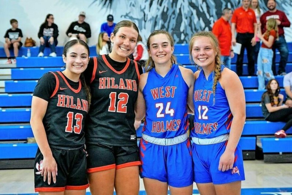 Holmes County was well represented at the District 5 East-West All-Star Game. Hiland’s Ashley Mullet, left, and Mallory Stutzman united with West Holmes seniors Keegan Uhl and Allie McMillen to spur the West to victory. Holmes County represents in East-West All-Star Game