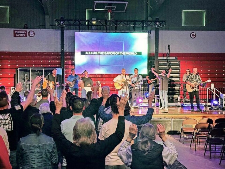 Praise and worship team members from around the area came together to help celebrate Easter through music and word during the community celebration on Good Friday. Risner shares message of redemption at Easter service