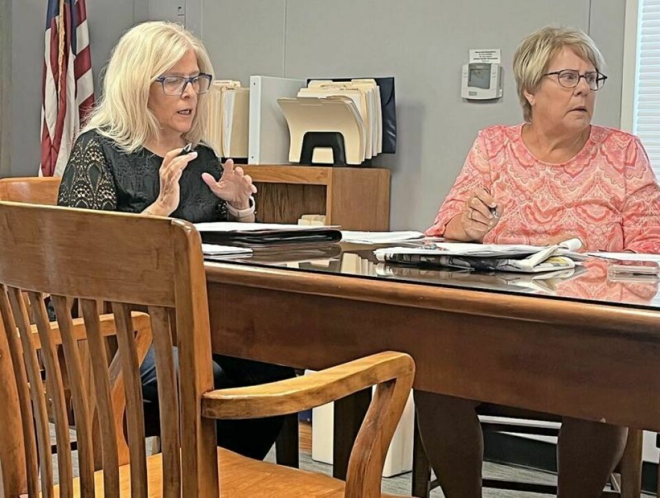 Mineral City Mayor Laurie Green, left, and fiscal officer Becky Carpenter brief council on an upcoming budget shortfall and need to increase revenue. Council discusses ways to address budget shortfall