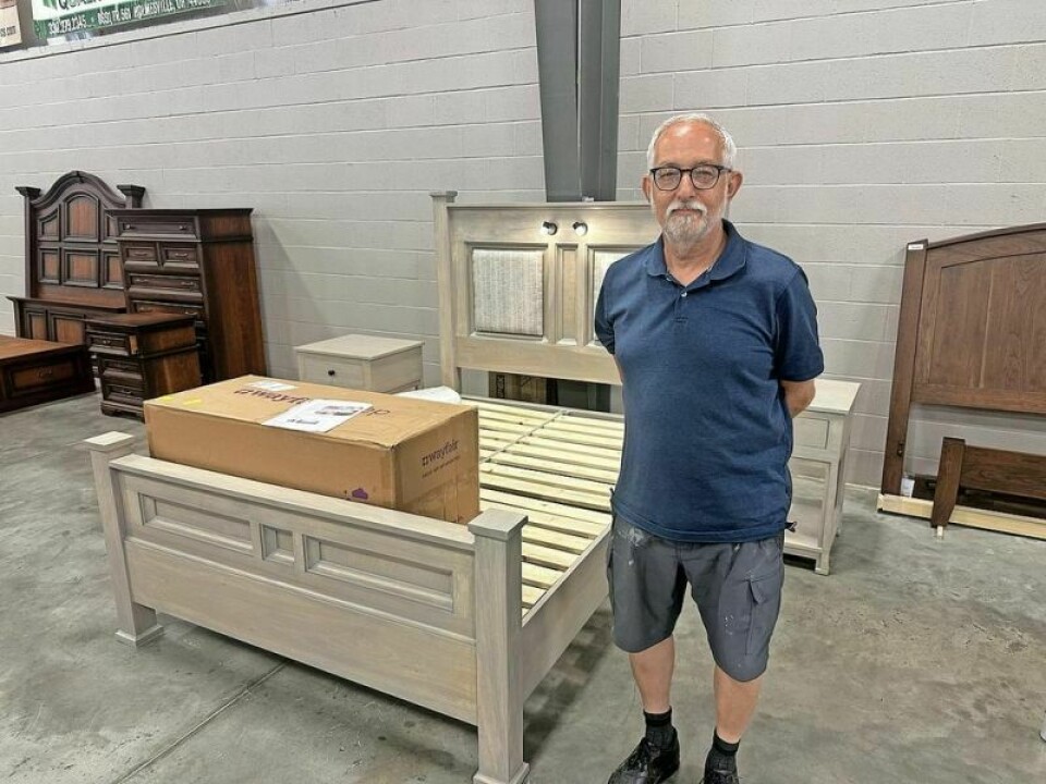 Maurice Stutzman built this queen bedroom suite and donated it to the Ohio Mennonite Relief Sale. His wife Carla made a quilt to go with it, and both brought extravagant prices in the auction. Stutzman-built bed set stays in the family after auction