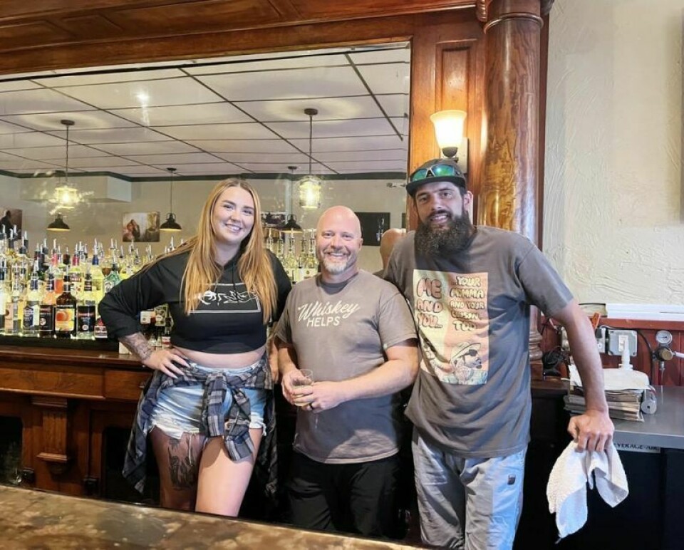 Amber Mulhall, left, Zach Salapack and Andrew Burgess in front of the antique bar back in El Albatross. The bar top was refinished with rolled copper and epoxy layers. Street tacos are the right recipe for Bolivar pub