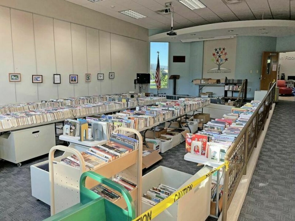 Thousands of books and other materials will be available for a freewill donation. Library book sale to raise funds for a new sidewalk