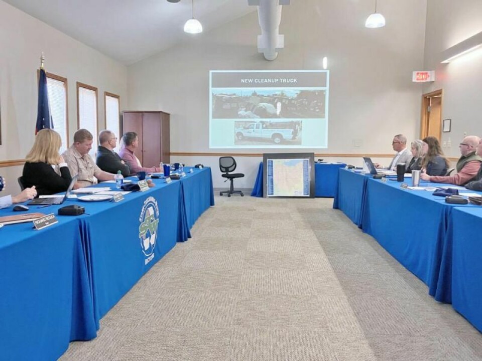 The board views a slide concerning the purchase of a recycling truck at Newcomerstown. Recycling district board of directors holds Nov. meeting