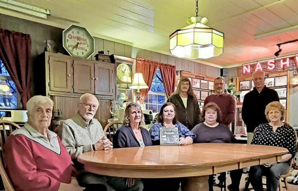Nashville book committee members pose with their new town history book, “A History of Nashville, Ohio.” The group researched their town’s history for a year before compiling it into a first-edition hardback that will be released in May. Pictured are Ruth Walkerow, seated left, Terry Saurer, Pat Lang, Rosanna Armbrust, Cinnamon Johnson and Cheryl Arwood. Standing in the back are Dan Gaul, Troy Miller and Craig Walkerow. Not pictured is Georgia Garnes. Village of Nashville 300-page book now available for preorder
