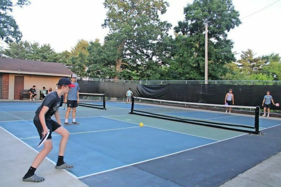 There could soon be an end to the pickleball court shortage in Dover. Here youth play pickleball at Dover City Park while others on both sides of the court wait for a turn. Currently, the city only has two courts available for use. Dover may get more pickleball courts