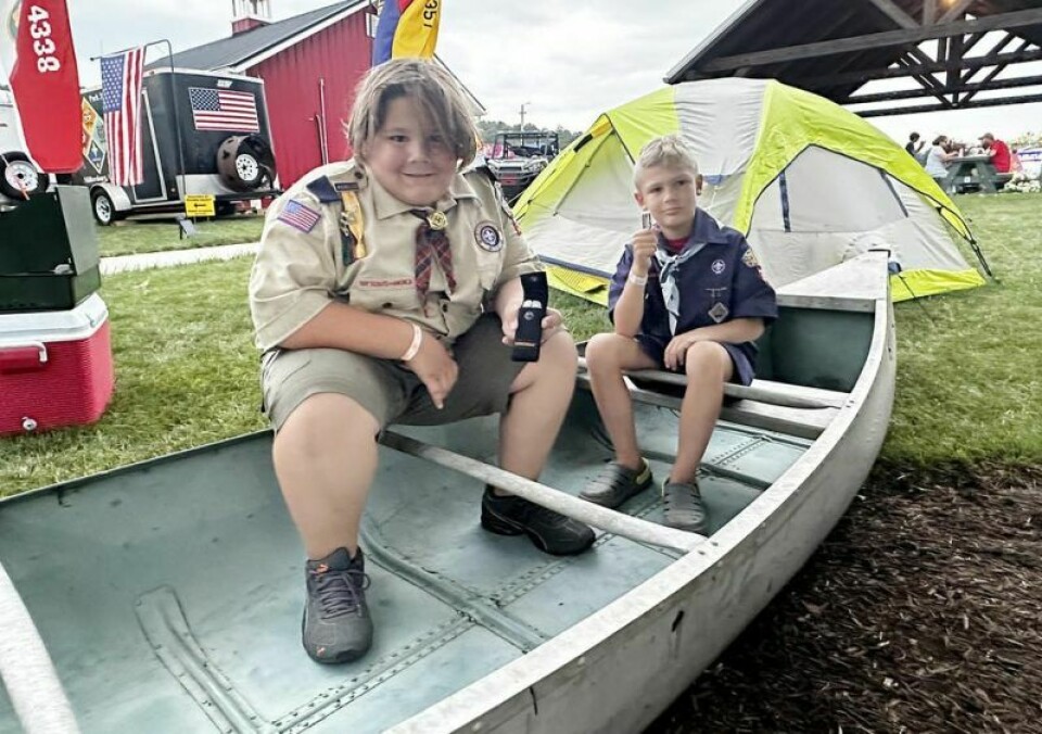 Brothers Ashton, left, and Desmond Riemenschneider were the inaugural winners of the Scouters of Holmes County Citizenship Bingo game. Scouters of Holmes Co. cap off fair with a splash