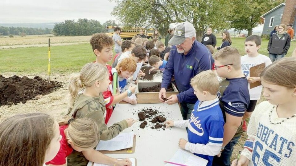 Jim Croskey, owner of DalRoy Farms, explains how worms are part of the process of breaking down soil that leads to conservation and a better crop. The process is called vermicomposting and utilizes earthworms and smaller microorganisms to break down the soil and help stabilize active organic materials. WH 5th Grade Farm Tour focuses on tiny workers