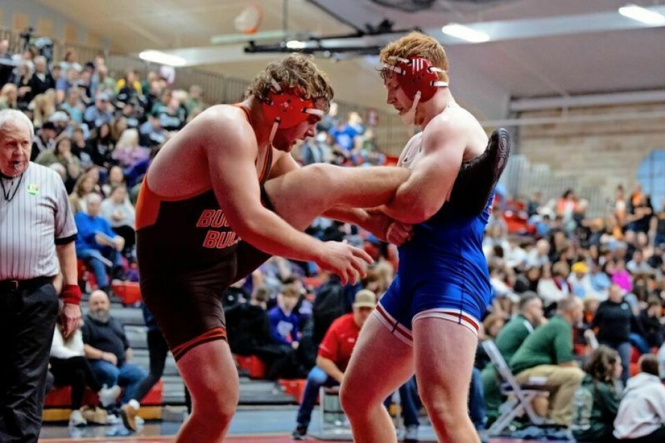 West Holmes’ Grant Miller, right, won both of his matches on senior night at West Holmes High School on Feb. 7. His first win of the night also was his 100th career victory and 75th career win by fall. Knights wrestling beats NP, falls to Dalton on Senior Night