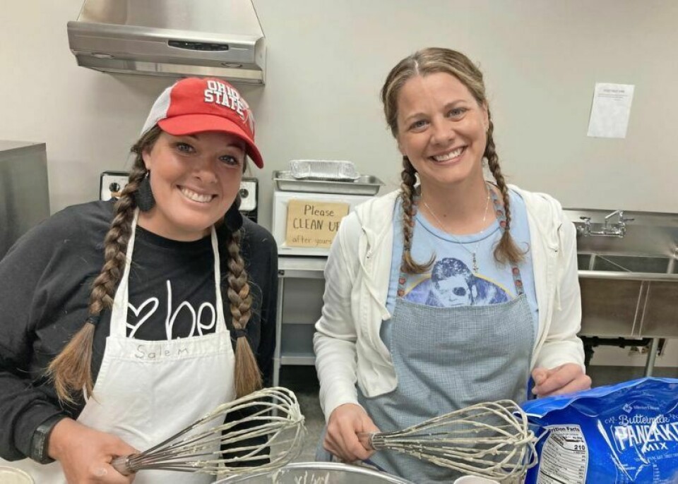 Rachael Clark, left, and Stephanie Ediger, mothers of members of the youth group at Salem Mennonite Church, help mix up pancakes at the 2022 youth group fundraiser breakfast. This year’s breakfast is Nov. 11. Breakfast to benefit Salem Mennonite youth group