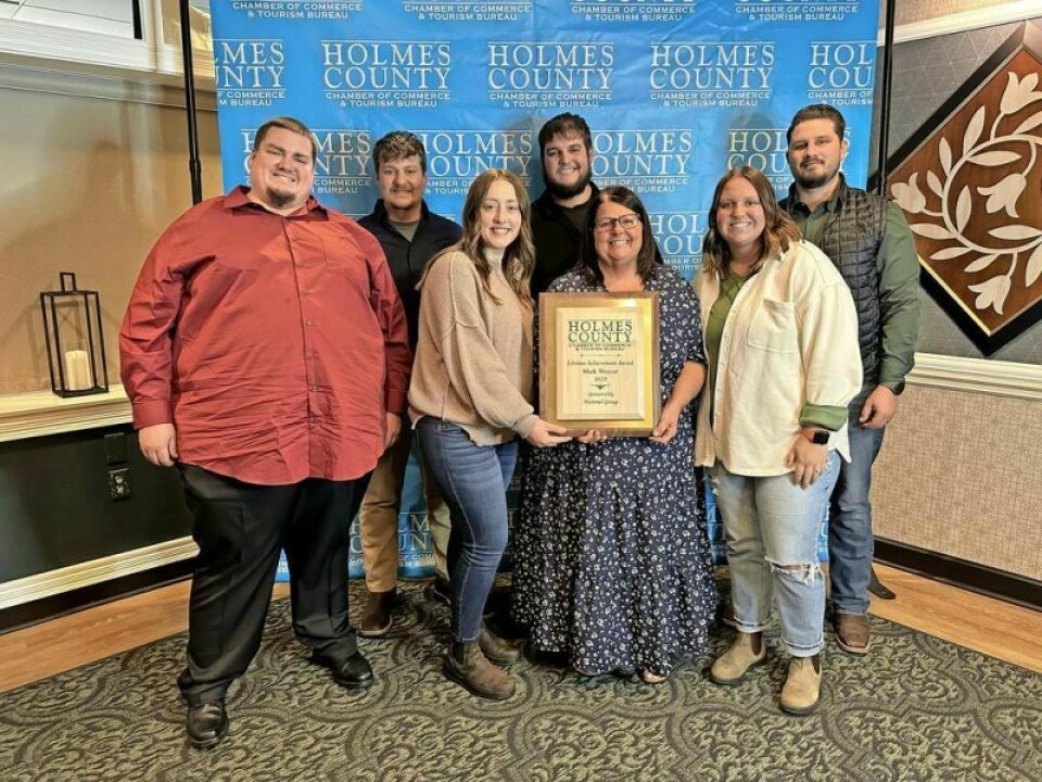 The family of Mark Weaver accepted the Holmes County Chamber of Commerce and Tourism Bureau Lifetime Achievement Award posthumously for Mark Weaver. Mark Weaver honored posthumously for his undeniable impact