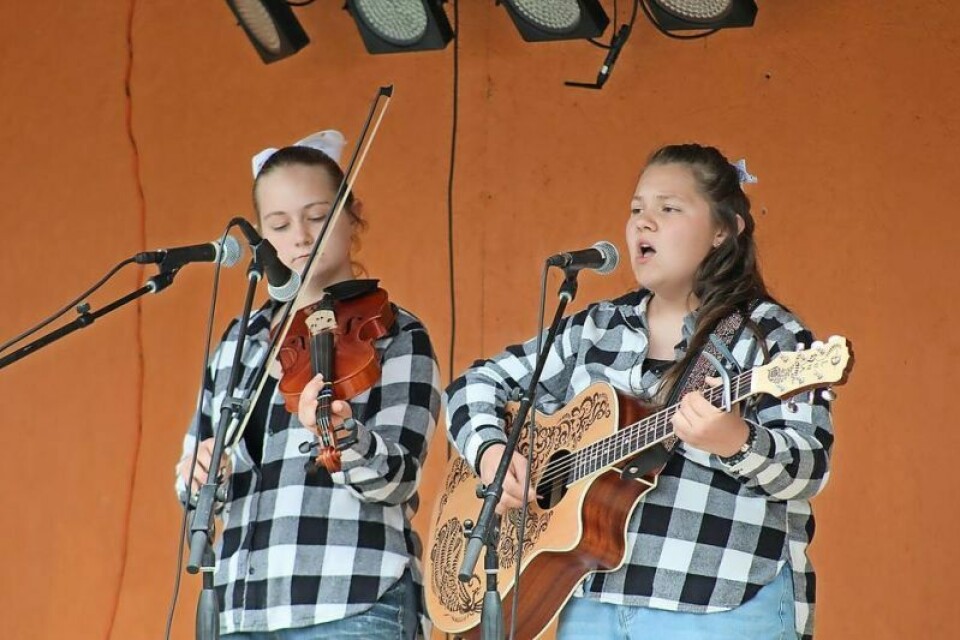 Aria, left, and Isla Dotts perform during the talent show. Dotts’ sisters win Midvale Miner’s Jubilee talent show