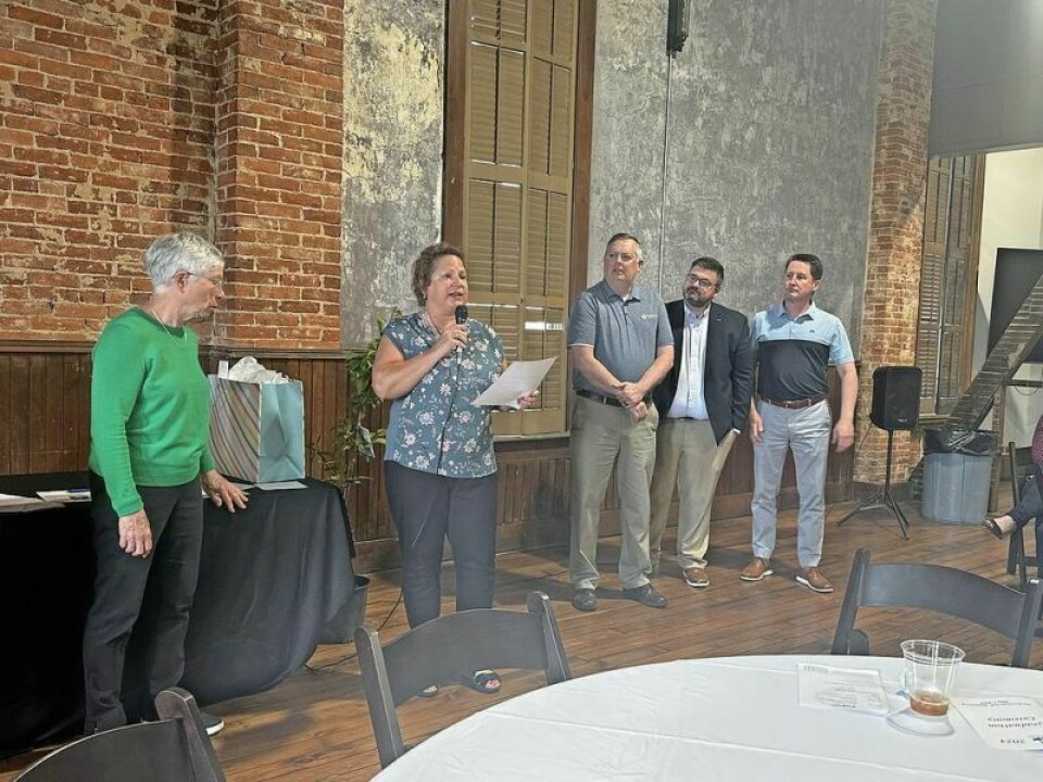 As a former Holmes County Chamber executive director, Shasta Mast, with microphone, is well versed in the efforts of Leadership Holmes County. Mast was selected to take over the reins of the program after more than two decades of success with former educator Leah Miller, left. Leadership Holmes County tabs Mast as new leader