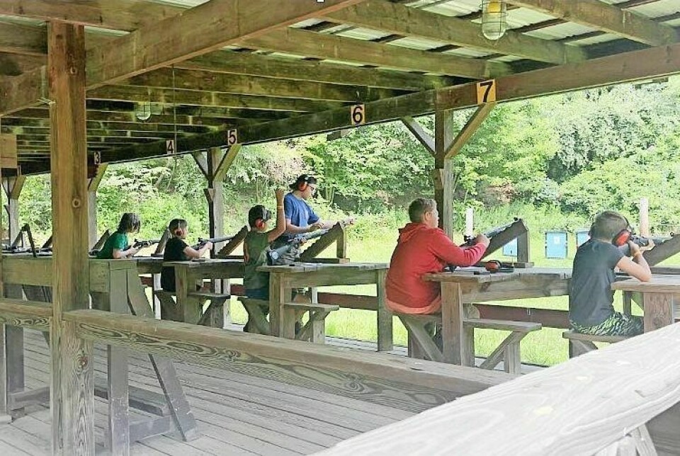 A group of Scouts take aim during a recent Scouting outing in Holmes County. It was a busy summer of activity for area Scouts. Holmes County Scouts had plenty to do this summer