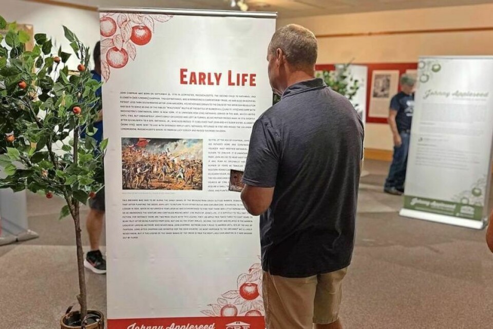 A visitor at the Cleo Redd Fisher Museum in Loudonville explores the Johnny Appleseed exhibit, open through Oct. 11. The museum is open weekdays, and admission is free. CRF Museum Appleseed exhibit runs through Oct. 11