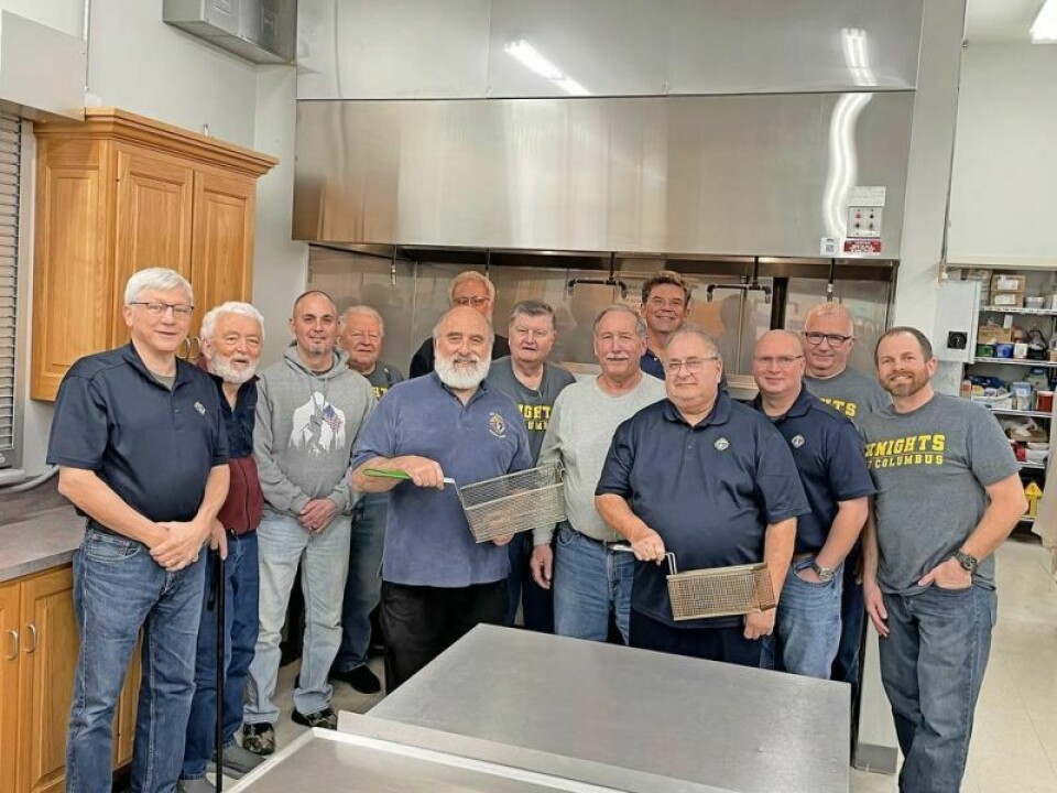 Holy Trinity Knights of Columbus Bolivar/Zoar will host six fish fry events during Lent. Ed Wills, left, Larry Kerr, Brian Loibl, Mark Yovanovich, Bob Gersna, holding basket, Angelo Pirolozzi, rrear, Mike Ryan, Dave Schaub, white shirt, Mike Galmish, Don Scott, other basket, Emmanuel Reinhehl, Jim Haueter, back with glasses, Matt Claxon, black T-shirt. Knights of Columbus hosts 19th fish fries
